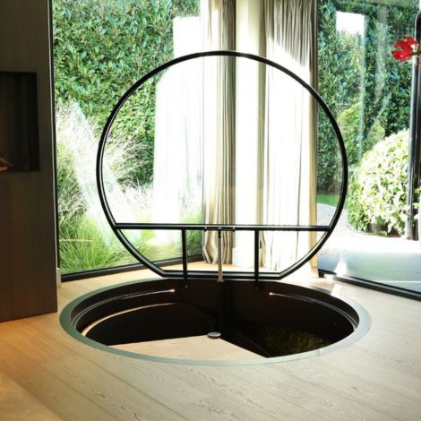 elektrisch glazen vloerluik